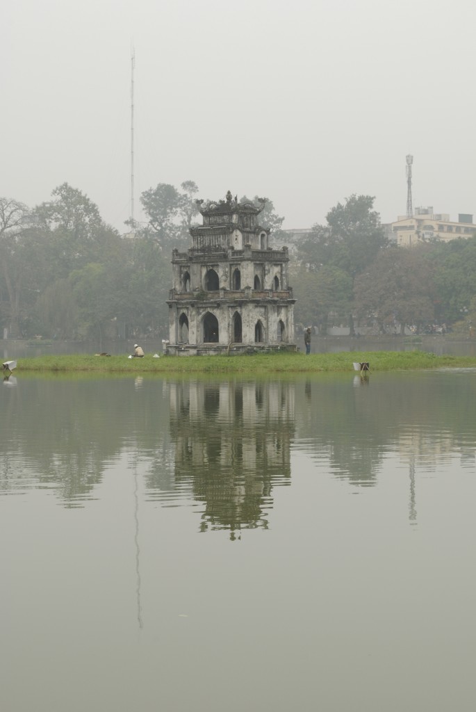 Pagoda (Turtle Tower) in the middle of Hoan Kiem lake.