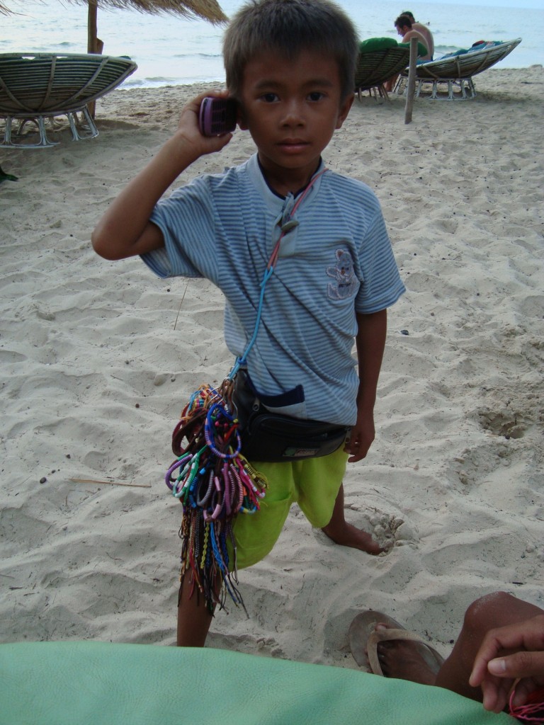 A little 4 or 5 yr old kid we got to know on Otres. He was always selling bracelets on the beach (hanging around his waist) and he really knew his way around an iPad better. Sometimes, like in this photo, we'd be talking and he would have to step away and take a phone call! It was the cutest and most hilarious thing. We figured it was his mom calling to check in.  
